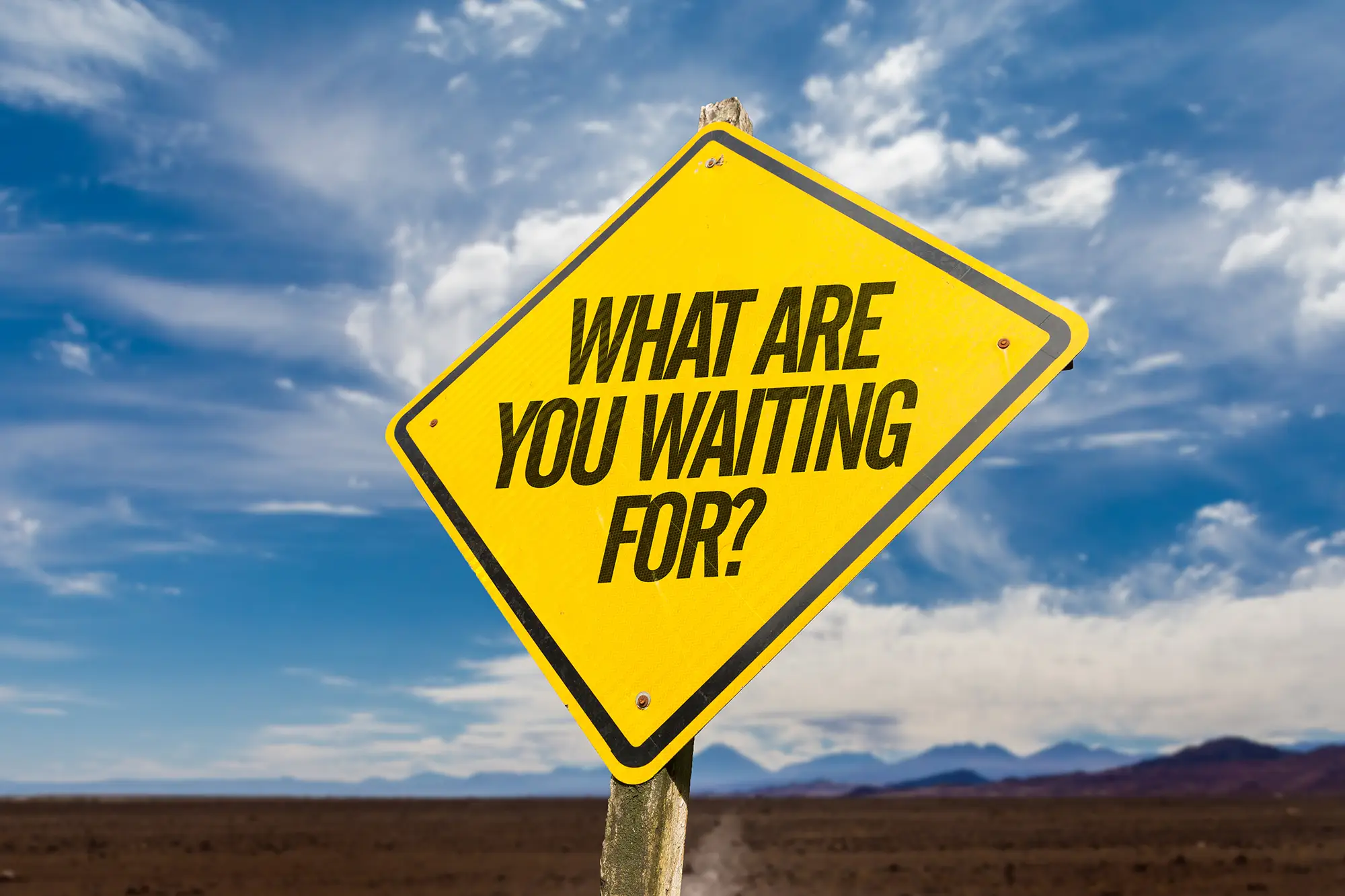 Road sign displaying: what are you waiting for?